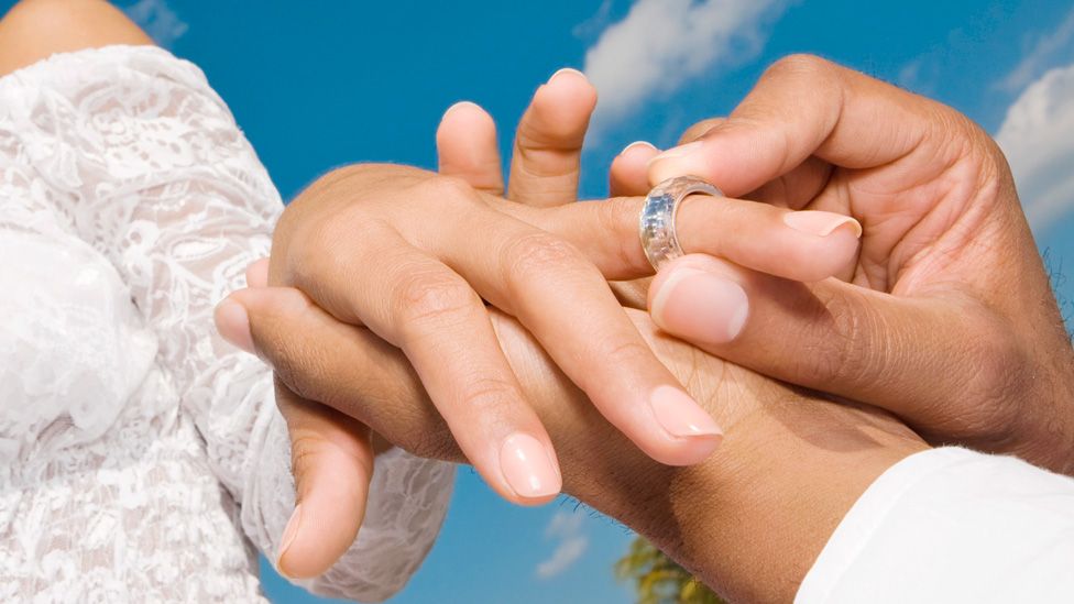 Court Overturns Ban on Men Taking Wives’ Surnames